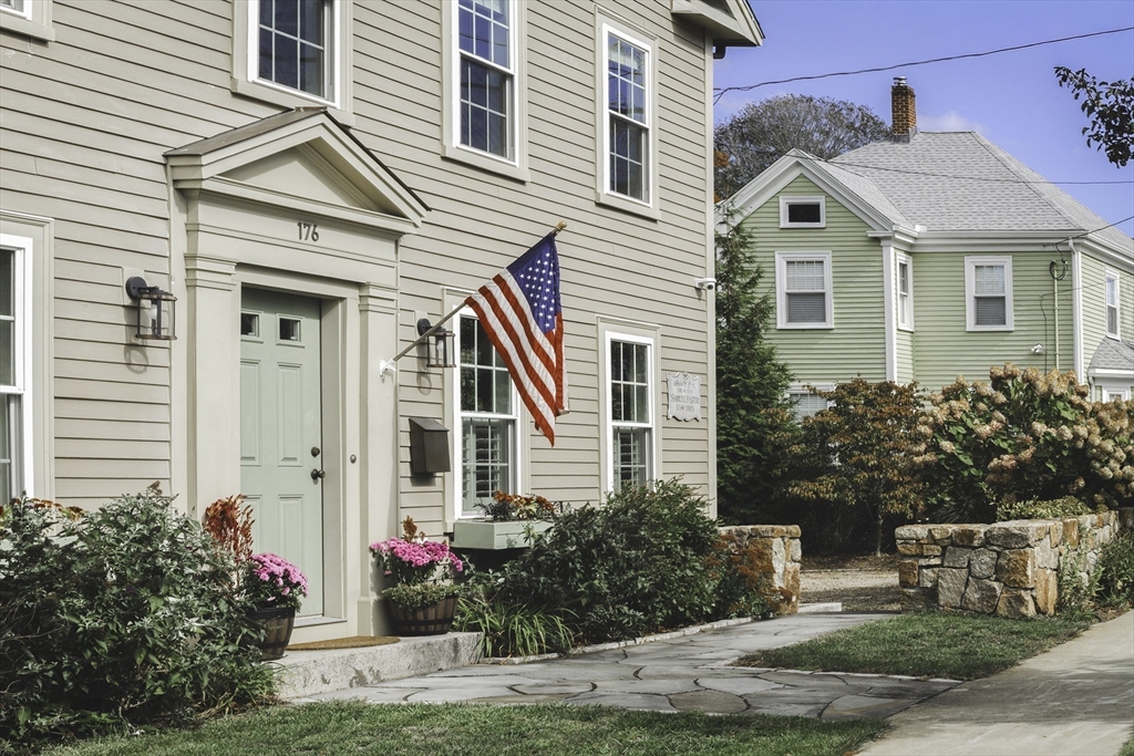 176 Hale Street Beverly, MA 01915 - Photo 2 of 41 a front view of a house with garden