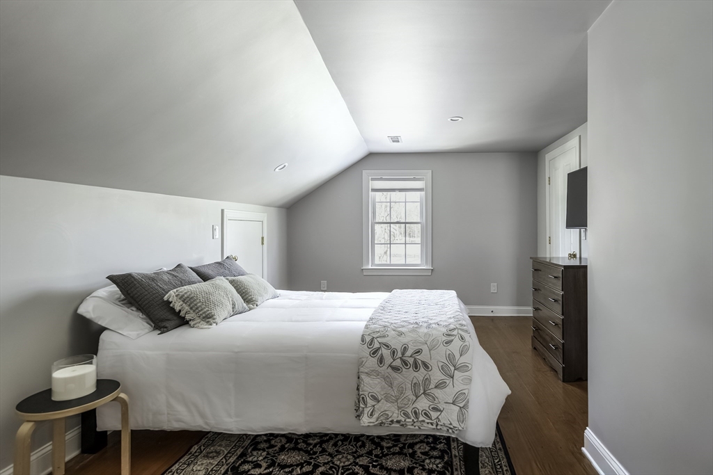 176 Hale Street Beverly, MA 01915 - Photo 25 of 41 a bedroom with a bed and a window