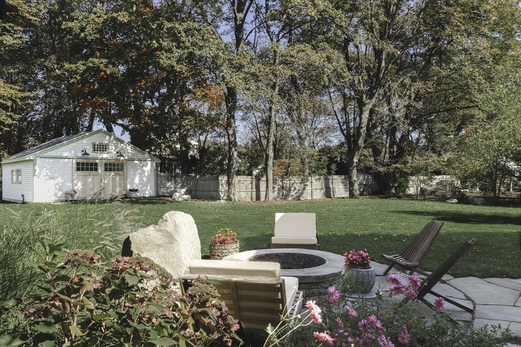 176 Hale Street Beverly, MA 01915 - Photo 3 of 41 a view of a house with backyard sitting area and garden