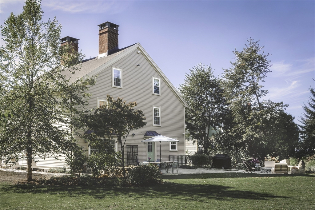 176 Hale Street Beverly, MA 01915 - Photo 31 of 41 a front view of a house with a yard