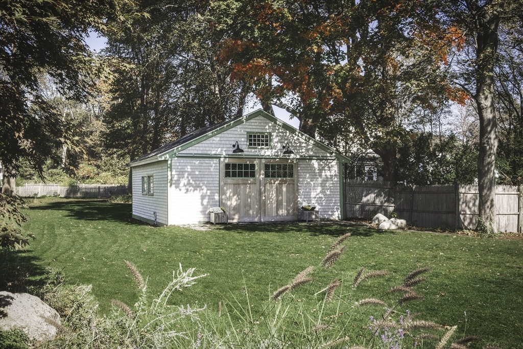 176 Hale Street Beverly, MA 01915 - Photo 33 of 41 a front view of house with yard and green space