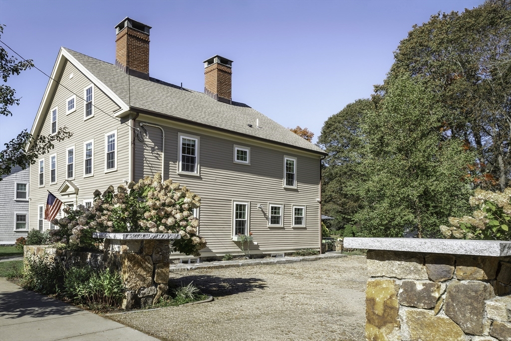 176 Hale Street Beverly, MA 01915 - Photo 35 of 41 a front view of a house with a yard