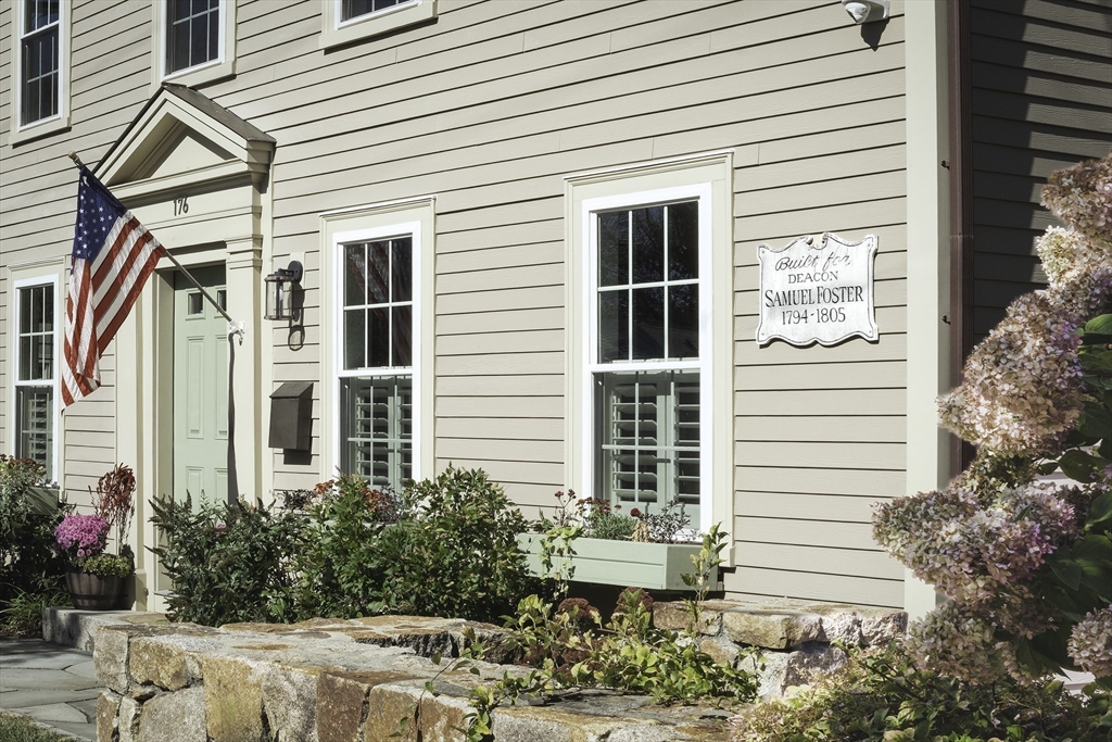 176 Hale Street Beverly, MA 01915 - Photo 39 of 41 a view of a house with a yard and sitting space