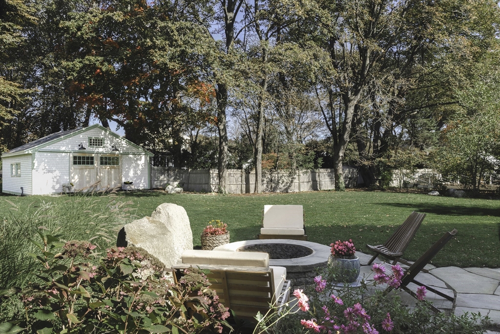 176 Hale Street Beverly, MA 01915 - Photo 41 of 41 a view of a house with backyard sitting area and garden