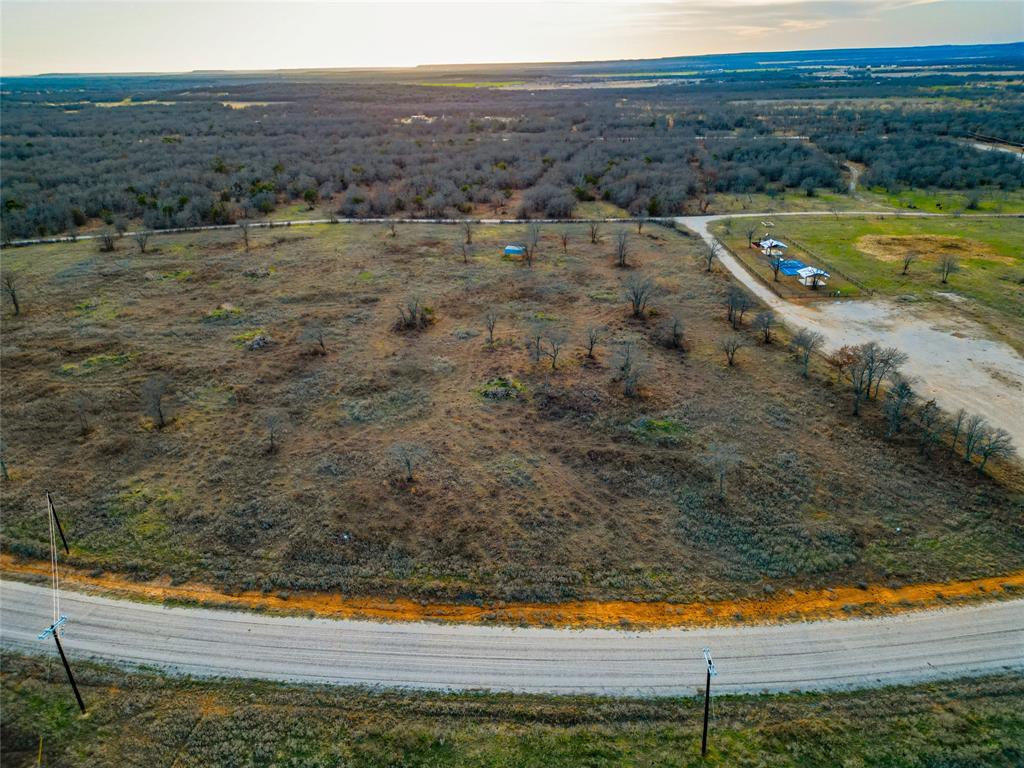 Lot 37 Paradise Oaks Ranch Perrin, TX 76486 - Photo 11 of 13 a view of an ocean and mountain
