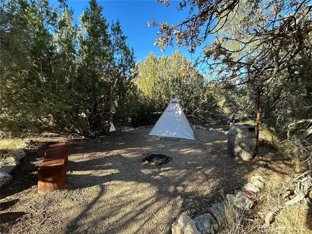 a view of backyard of a house