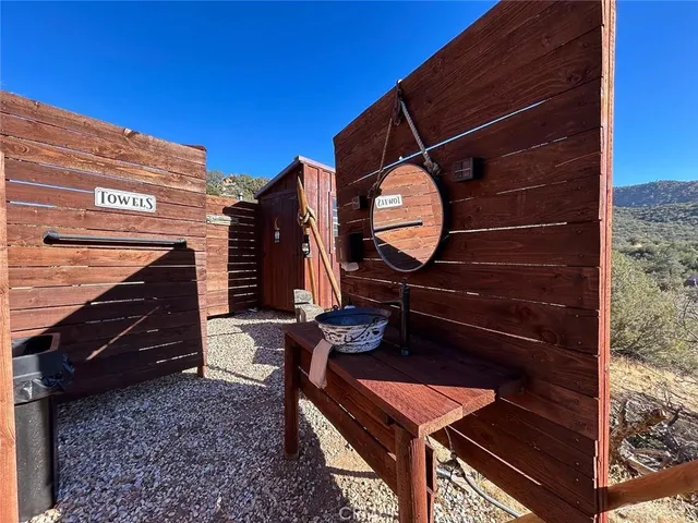 a view of a door and a chair