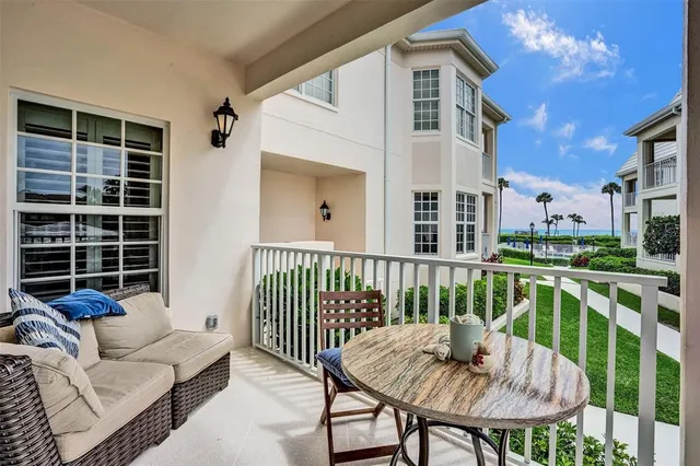 a view of a chair and tables front of the house