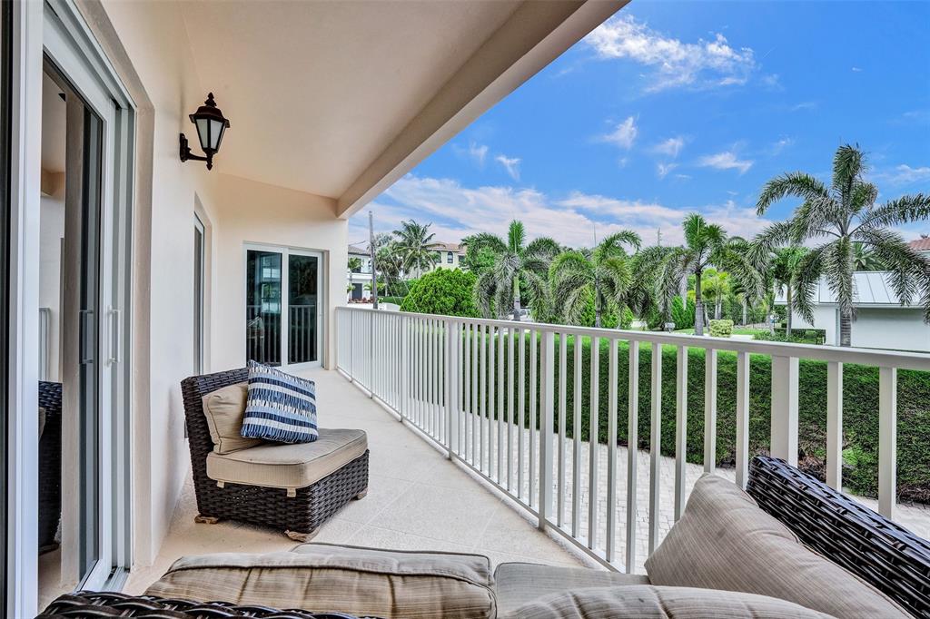 5900 Old Ocean Boulevard, Unit A9 Ocean Ridge, FL 33435 - Photo 23 of 29 a balcony with furniture and a potted plant