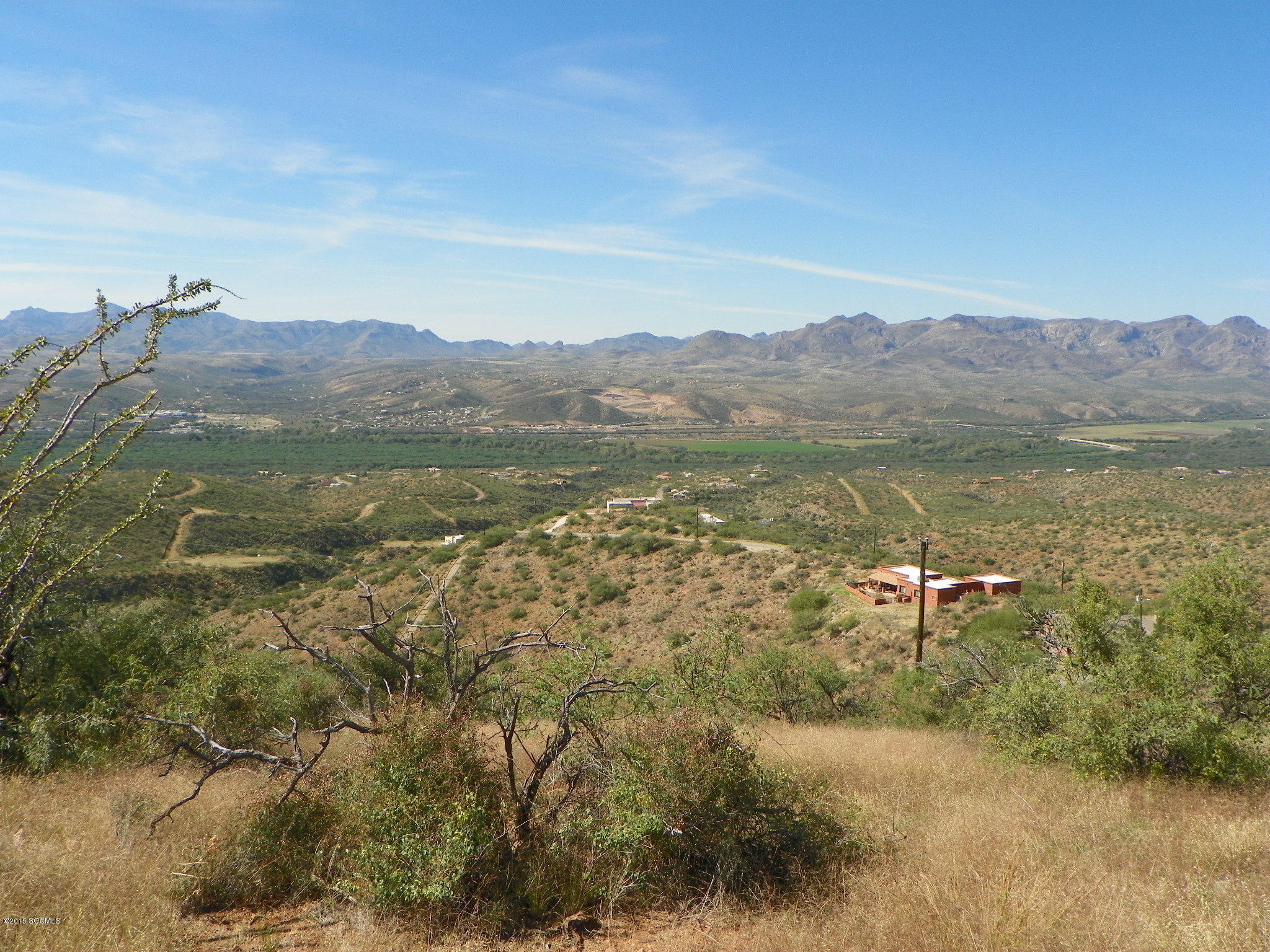 1523 Pirana Court Rio Rico, AZ 85648 - Photo 11 of 13 a view of a lake with a mountain