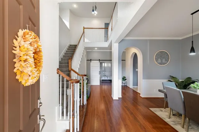 a view of entryway with wooden floor