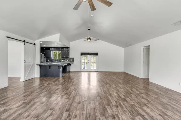 a view of an empty room and window