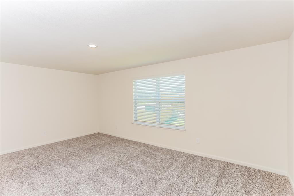 140 Switchback Hl Road Newark, TX 76071 - Photo 9 of 17 an empty room with a window