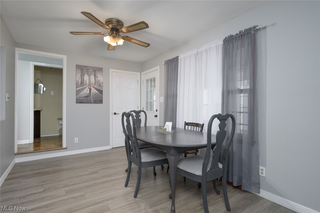 1165 Meadowview Road Kent, OH 44240 - Photo 8 of 40 Dining space with wood-type flooring and ceiling fan