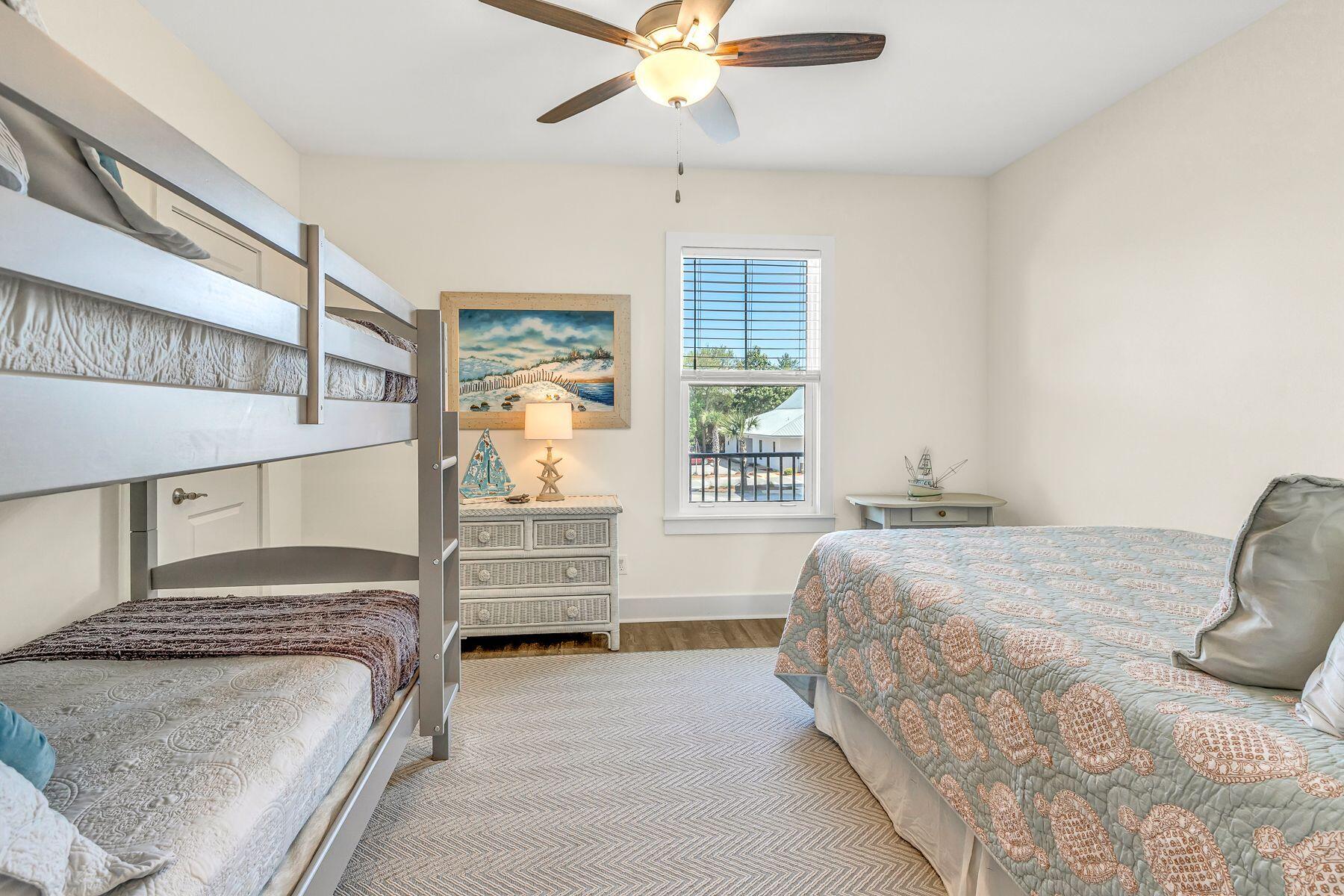 4000 West County Highway 30A, Unit 322 Santa Rosa Beach, FL 32459 - Photo 18 of 30 a bedroom with a bed and window