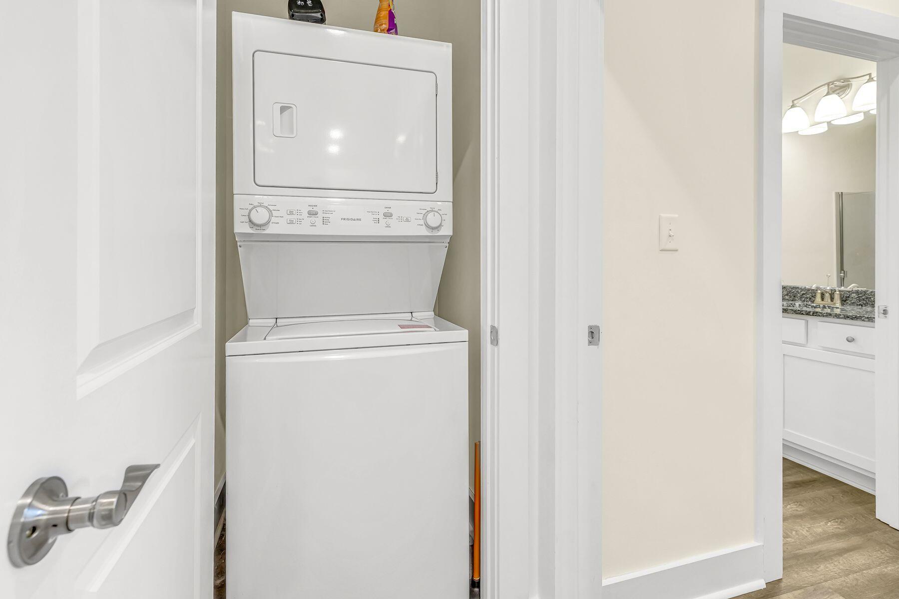 4000 West County Highway 30A, Unit 322 Santa Rosa Beach, FL 32459 - Photo 19 of 30 a utility room with dryer and washer