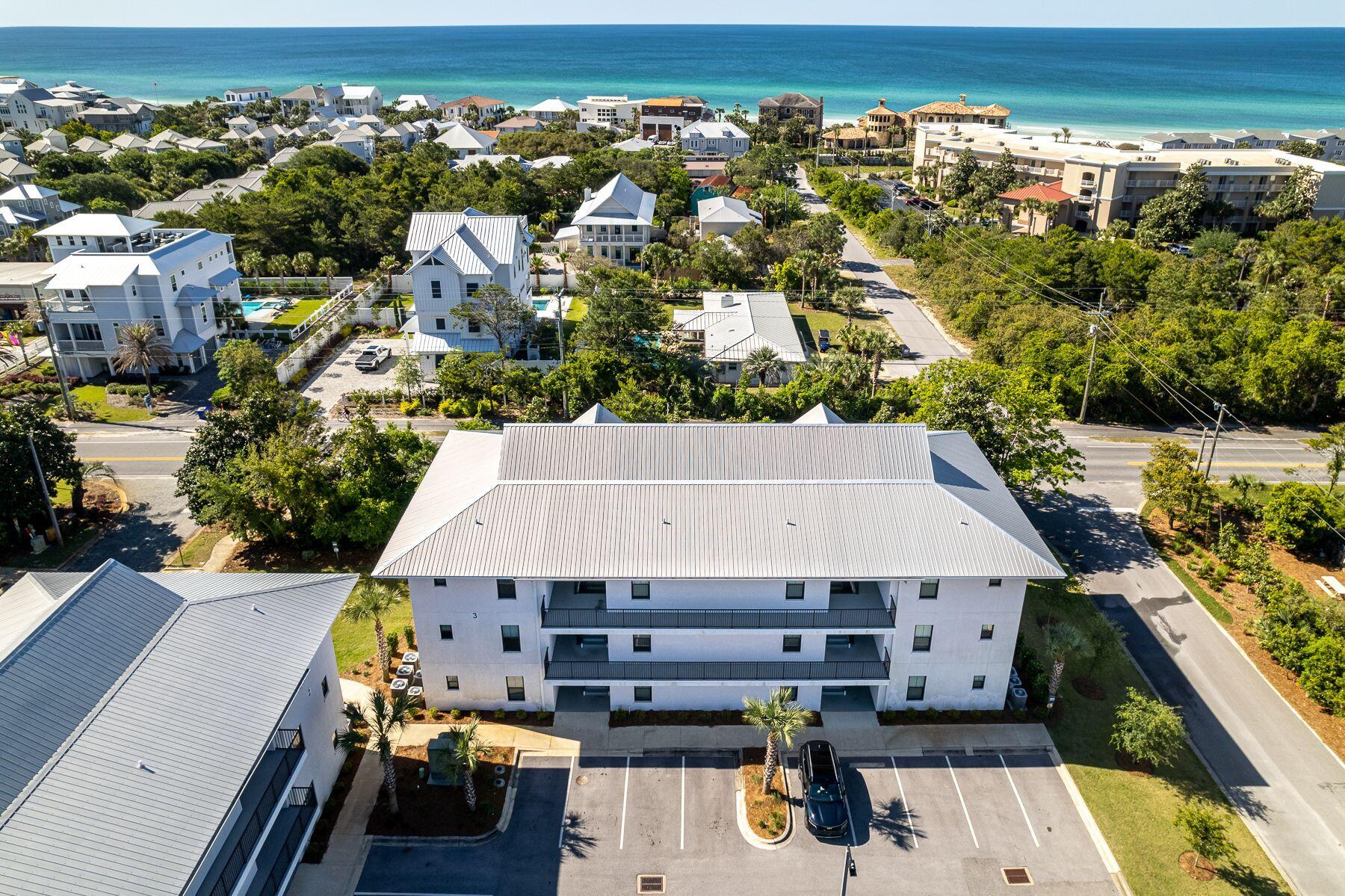 4000 West County Highway 30A, Unit 322 Santa Rosa Beach, FL 32459 - Photo 21 of 30 an aerial view of a house with a garden view