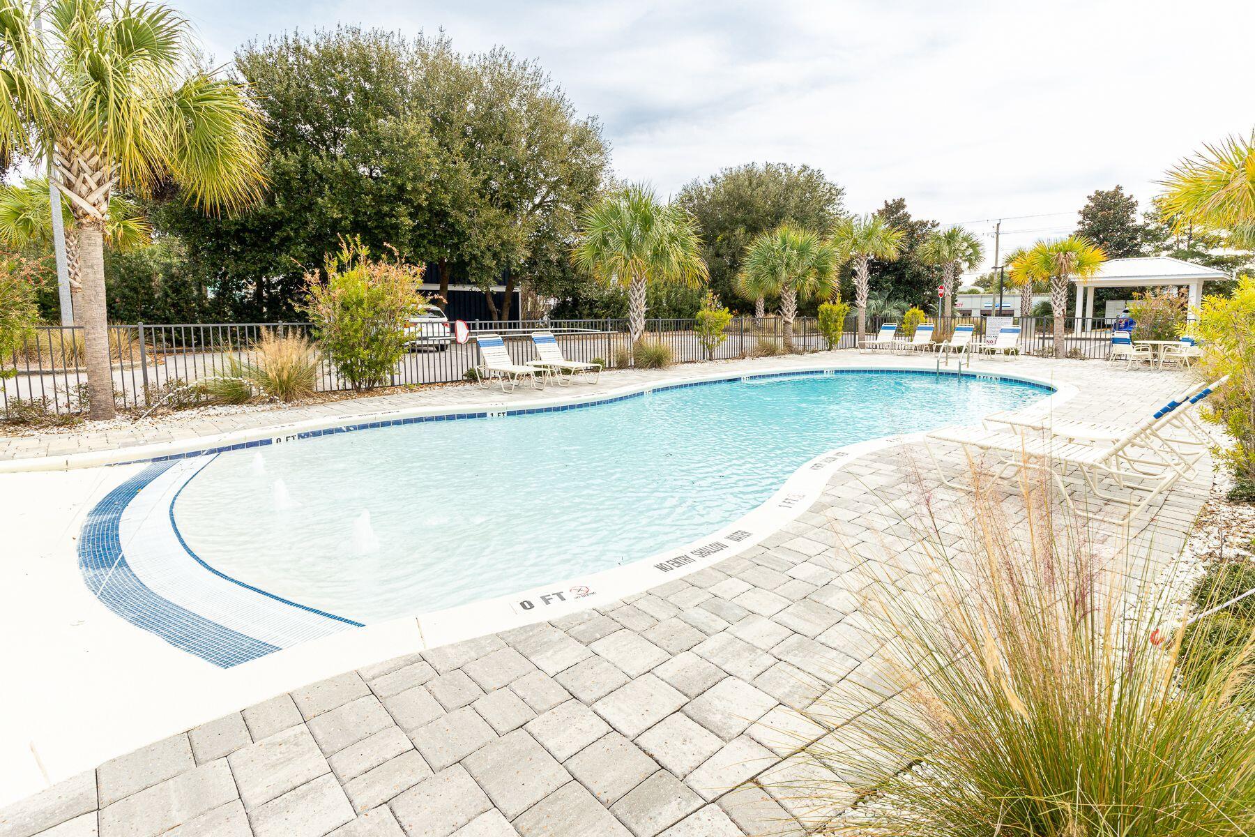 4000 West County Highway 30A, Unit 322 Santa Rosa Beach, FL 32459 - Photo 23 of 30 a view of outdoor space yard and swimming pool