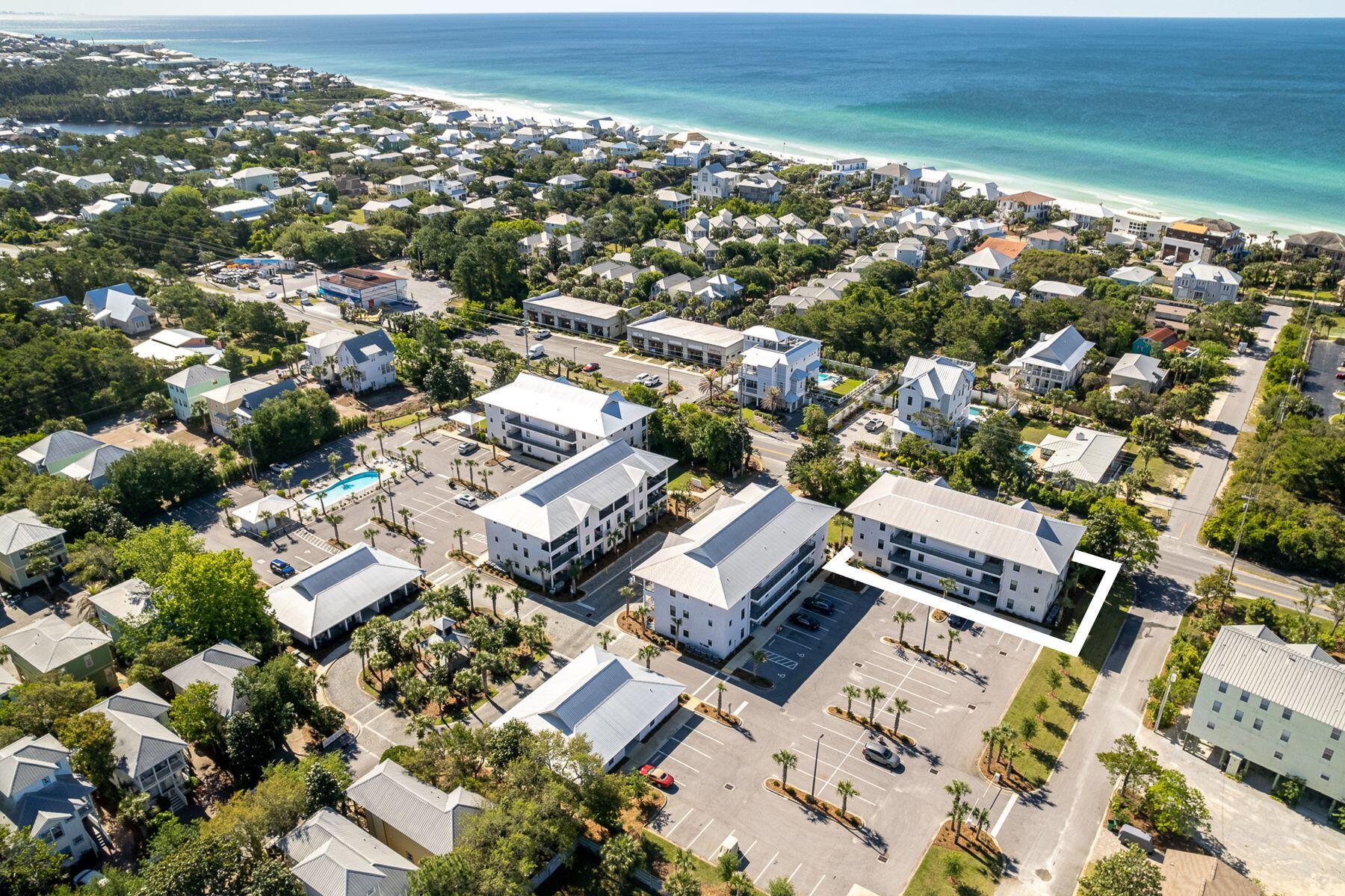 4000 West County Highway 30A, Unit 322 Santa Rosa Beach, FL 32459 - Photo 30 of 30 an aerial view of residential building with parking