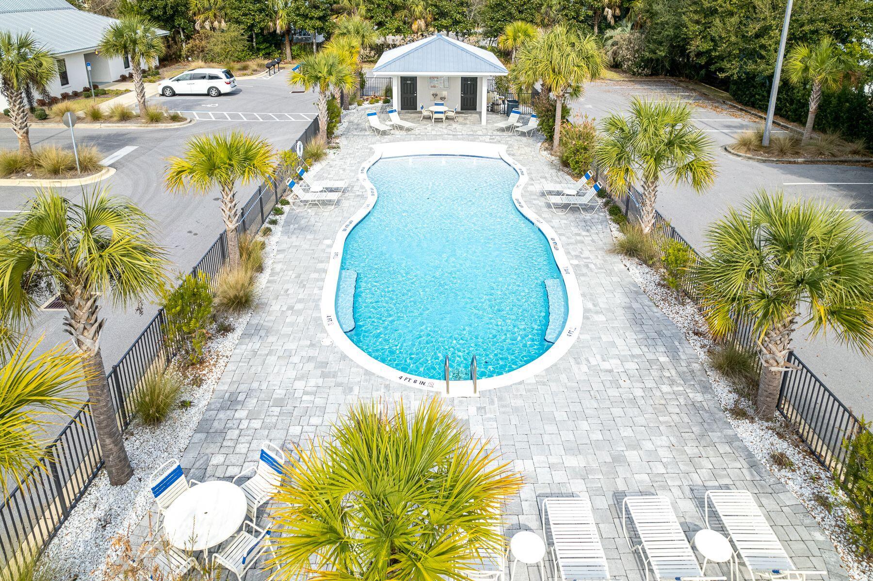 4000 West County Highway 30A, Unit 322 Santa Rosa Beach, FL 32459 - Photo 5 of 30 a view of a swimming pool with a patio