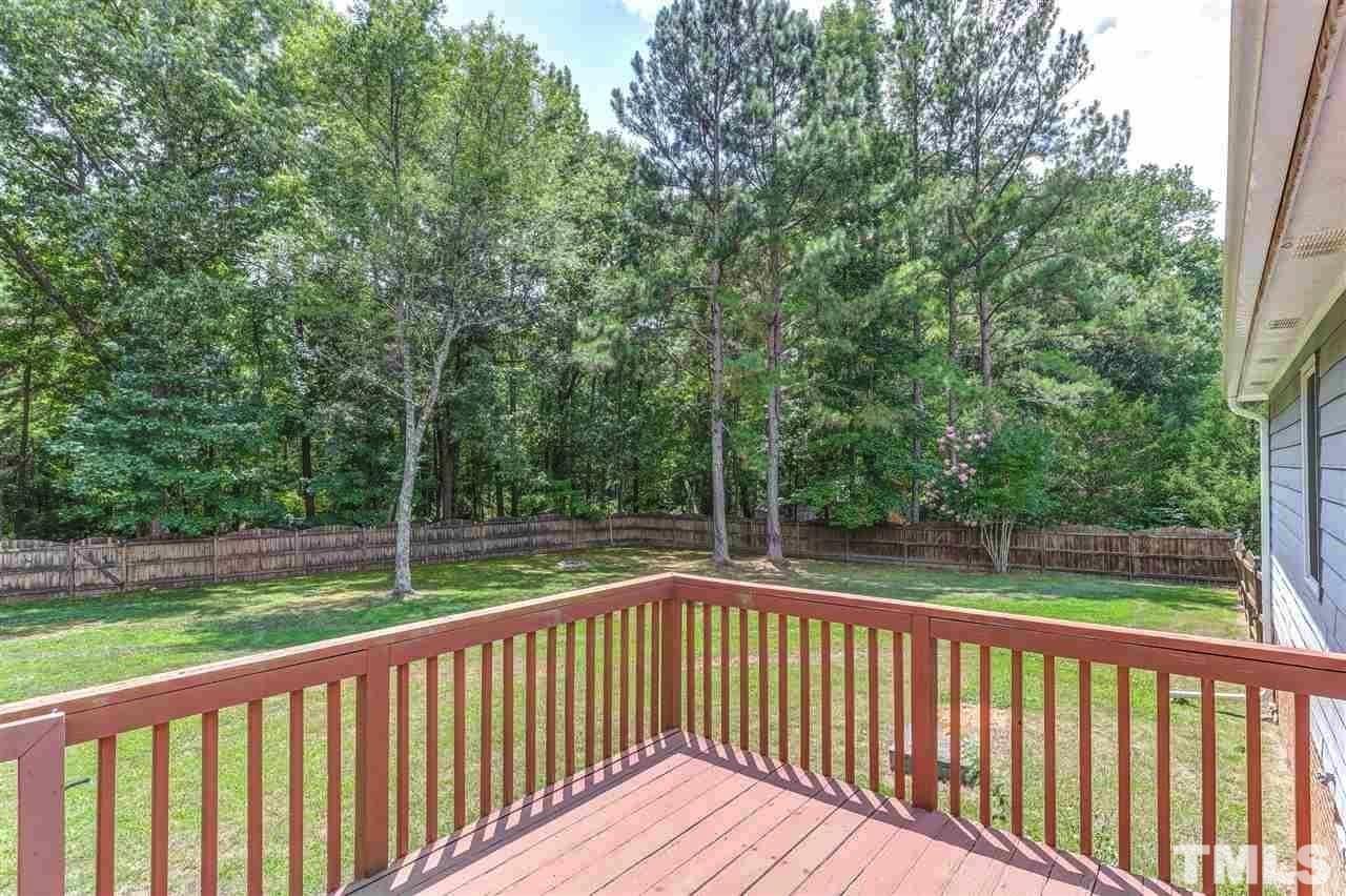 4312 Rockside Hills Drive Raleigh, NC 27603 - Photo 5 of 5 a view of deck and yard