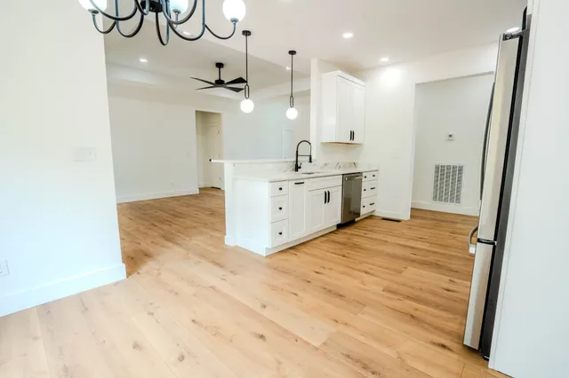 a bathroom with a bathtub and shower