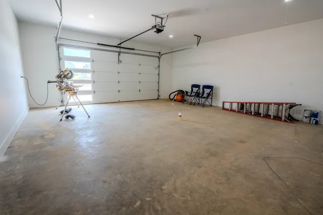 an empty room with mirror