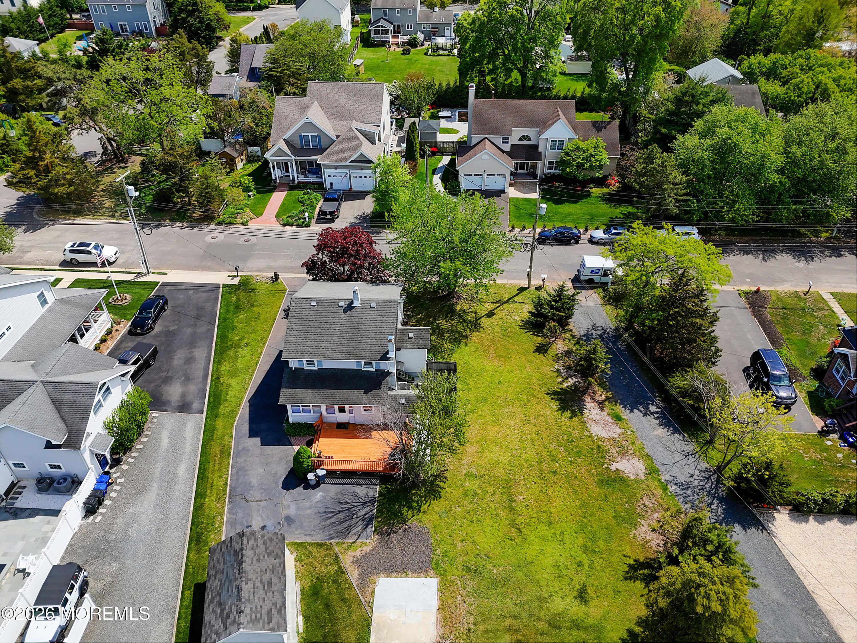 715 Howe Street Point Pleasant, NJ 08742 - Photo 38 of 45 an aerial view of residential houses with swimming pool