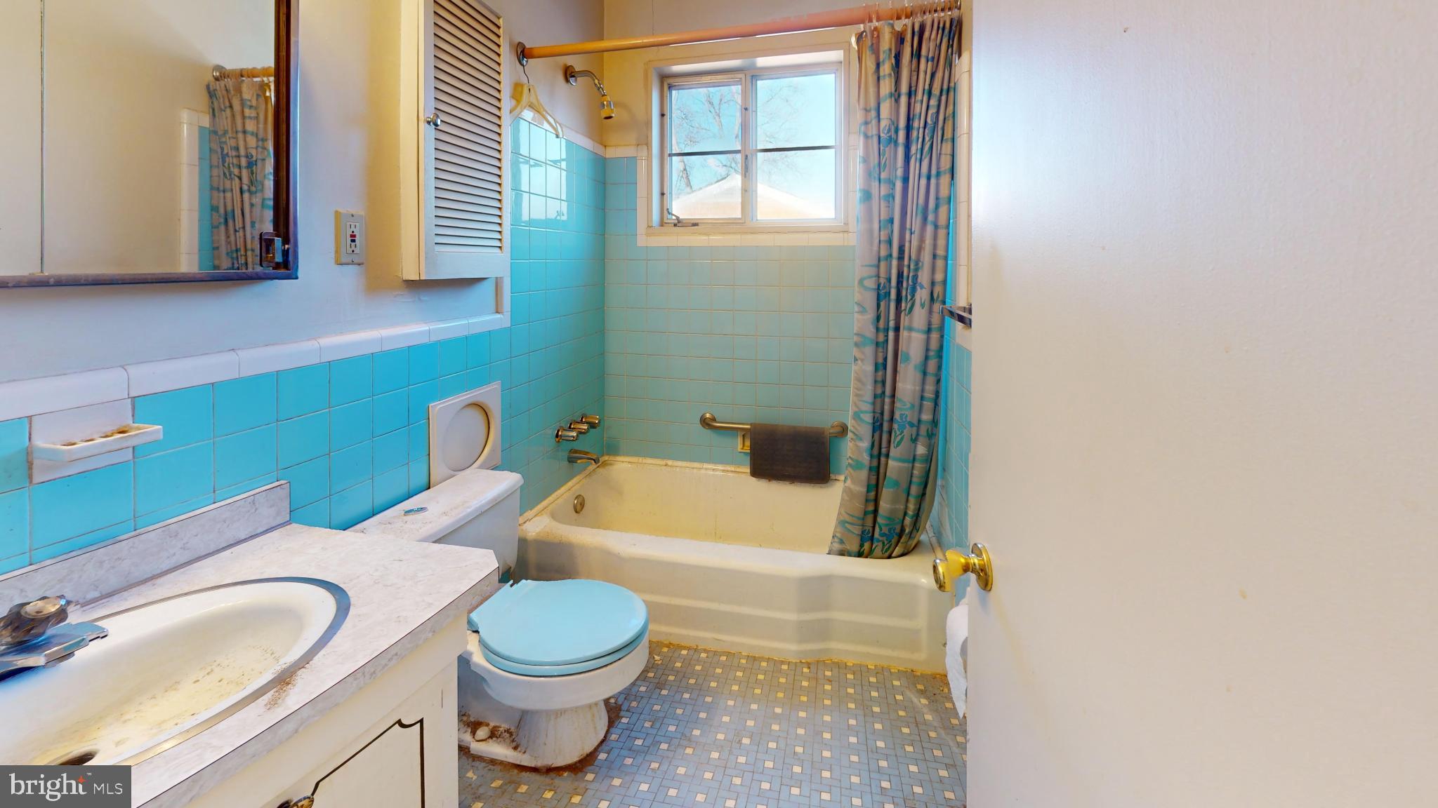 3701 Kenway Street Silver Spring, MD 20906 - Photo 12 of 28 Charming vintage bathroom with retro tiles.