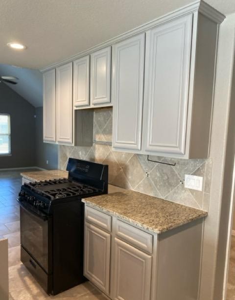 18003 Svensson Slade Lane Houston, TX 77044 - Photo 16 of 24 a kitchen with granite countertop a sink stove and cabinets