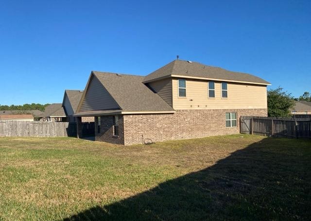 18003 Svensson Slade Lane Houston, TX 77044 - Photo 23 of 24 a view of a house with a yard