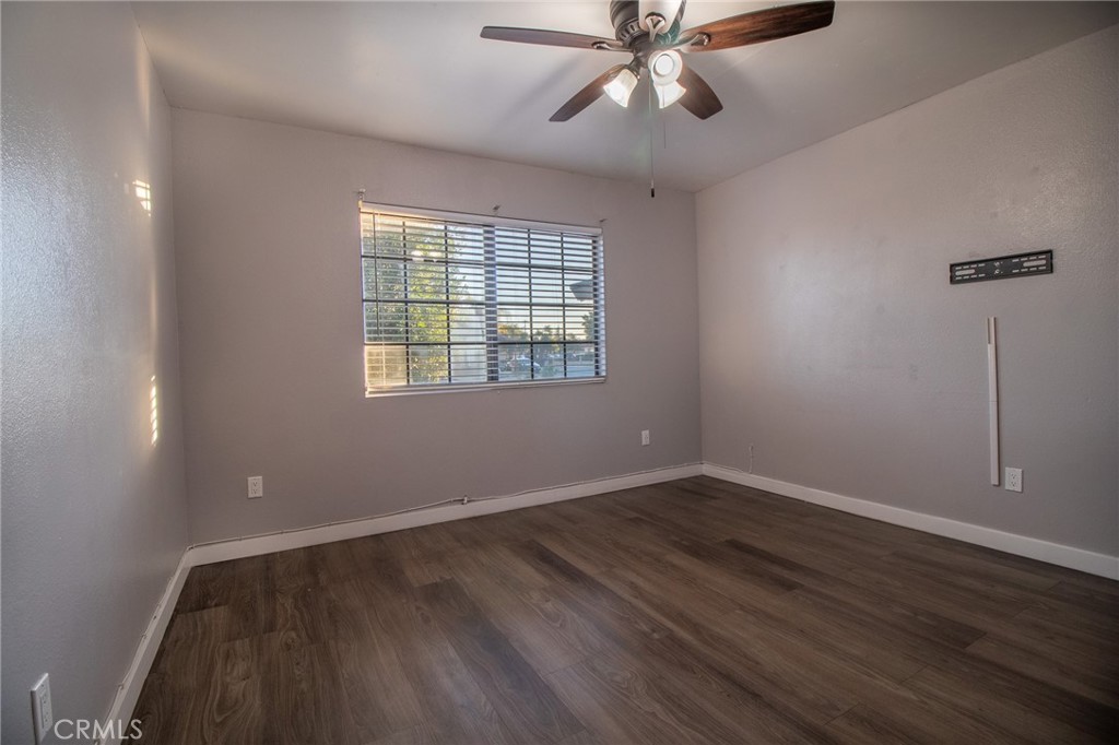 3112 Lynae Way Hemet, CA 92545 - Photo 13 of 26 wooden floor in an empty room with a window