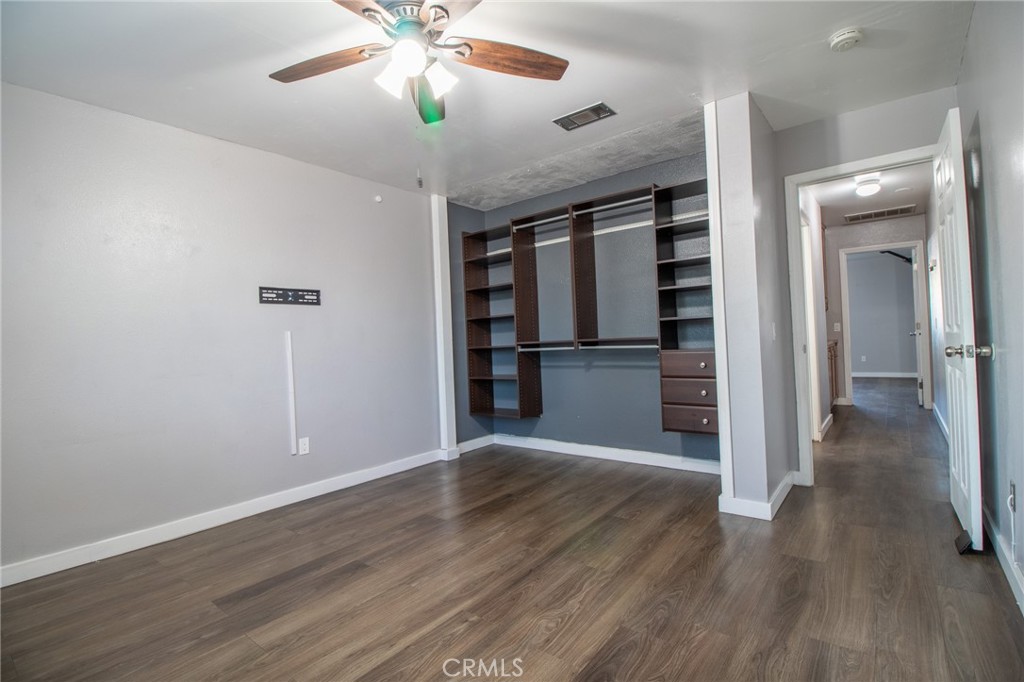 3112 Lynae Way Hemet, CA 92545 - Photo 14 of 26 wooden floor in an empty room with a window