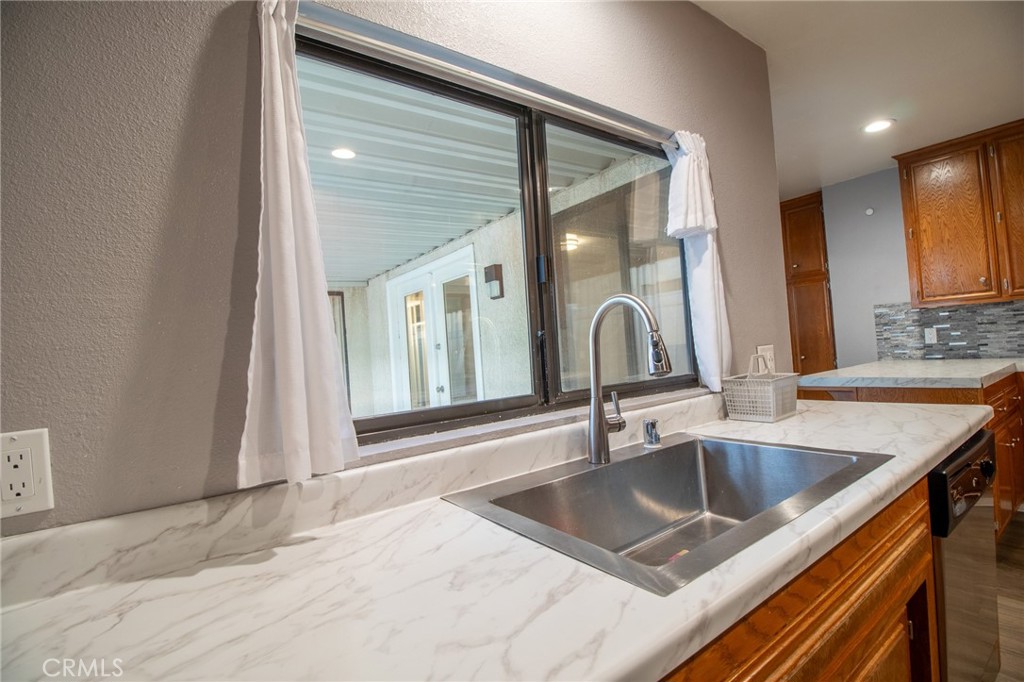 3112 Lynae Way Hemet, CA 92545 - Photo 10 of 26 a kitchen with a sink and a window