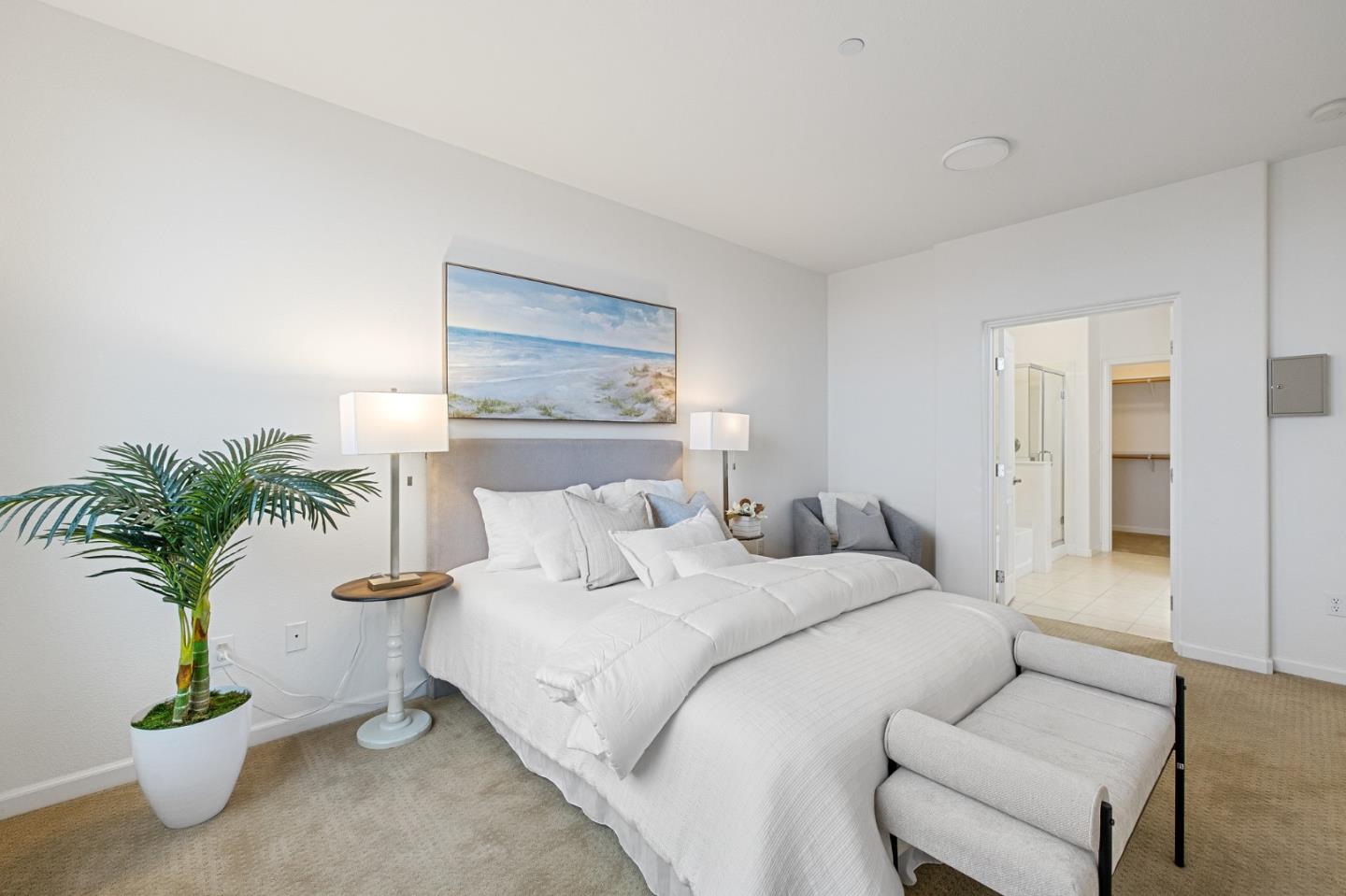 1388 Broadway, Unit 477 Millbrae, CA 94030 - Photo 15 of 33 a bedroom with a bed and a potted plant