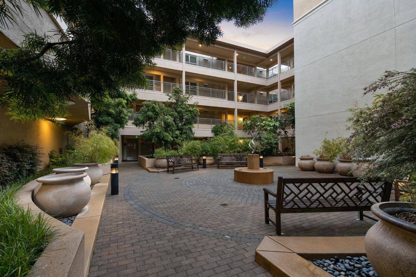 1388 Broadway, Unit 477 Millbrae, CA 94030 - Photo 27 of 33 a view of a patio with couches and potted plants