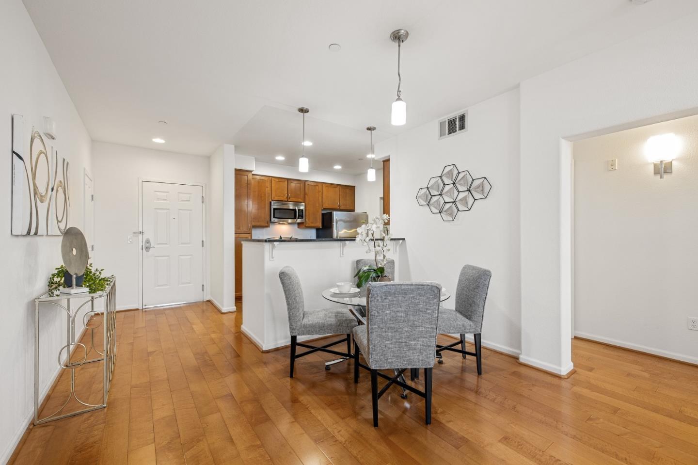 1388 Broadway, Unit 477 Millbrae, CA 94030 - Photo 8 of 33 a view of a dining room with furniture and wooden floor