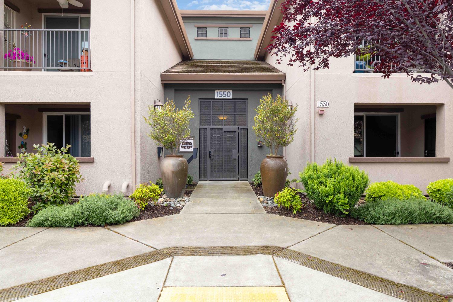 1550 Topanga Lane, Unit 101 Lincoln, CA 95648 - Photo 1 of 27 a front view of a house with garden