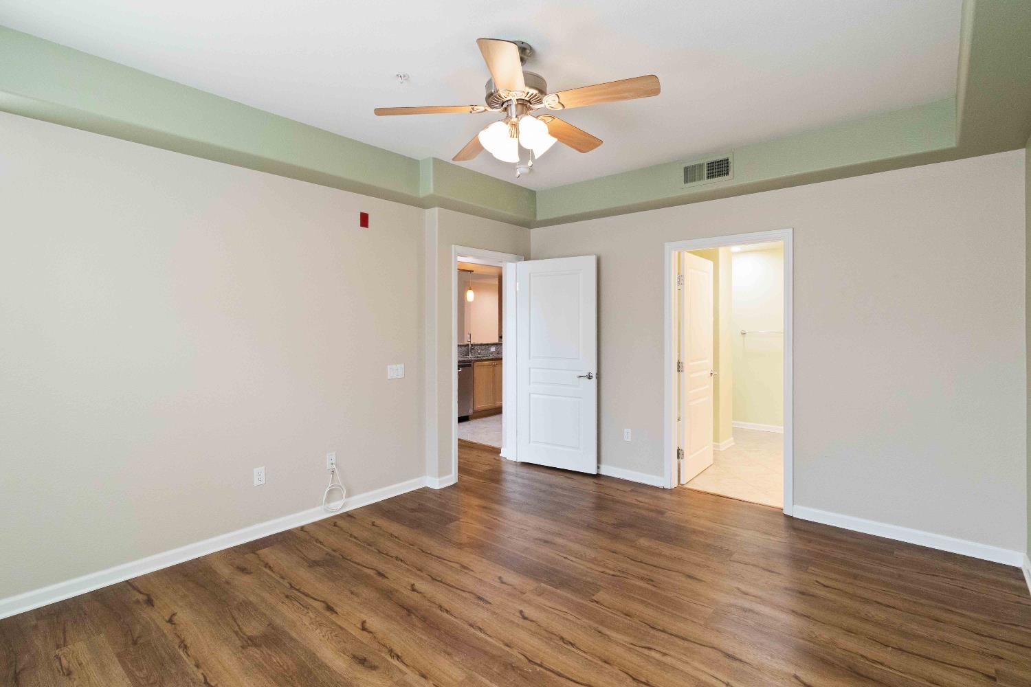 1550 Topanga Lane, Unit 101 Lincoln, CA 95648 - Photo 16 of 27 a view of an empty room and wooden floor