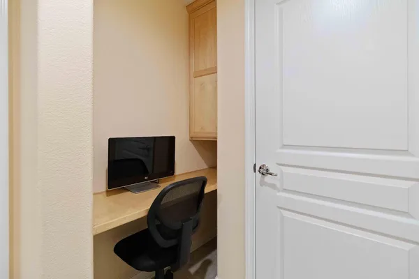 a room with a chair and dryer
