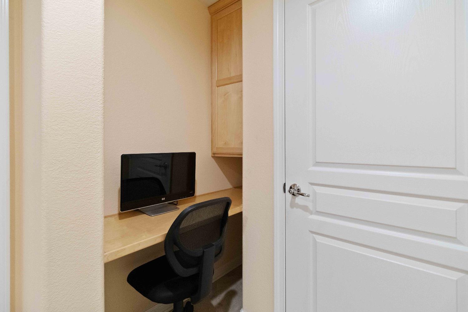 1550 Topanga Lane, Unit 101 Lincoln, CA 95648 - Photo 24 of 27 a room with a chair and dryer