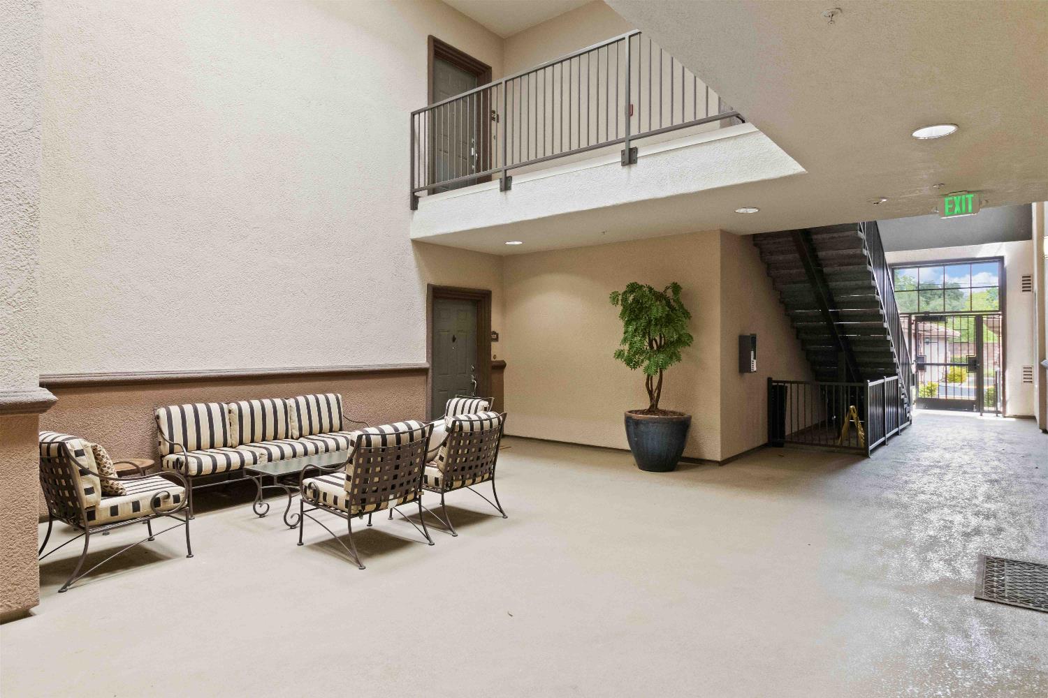 1550 Topanga Lane, Unit 101 Lincoln, CA 95648 - Photo 3 of 27 a view of livingroom with furniture and staircase