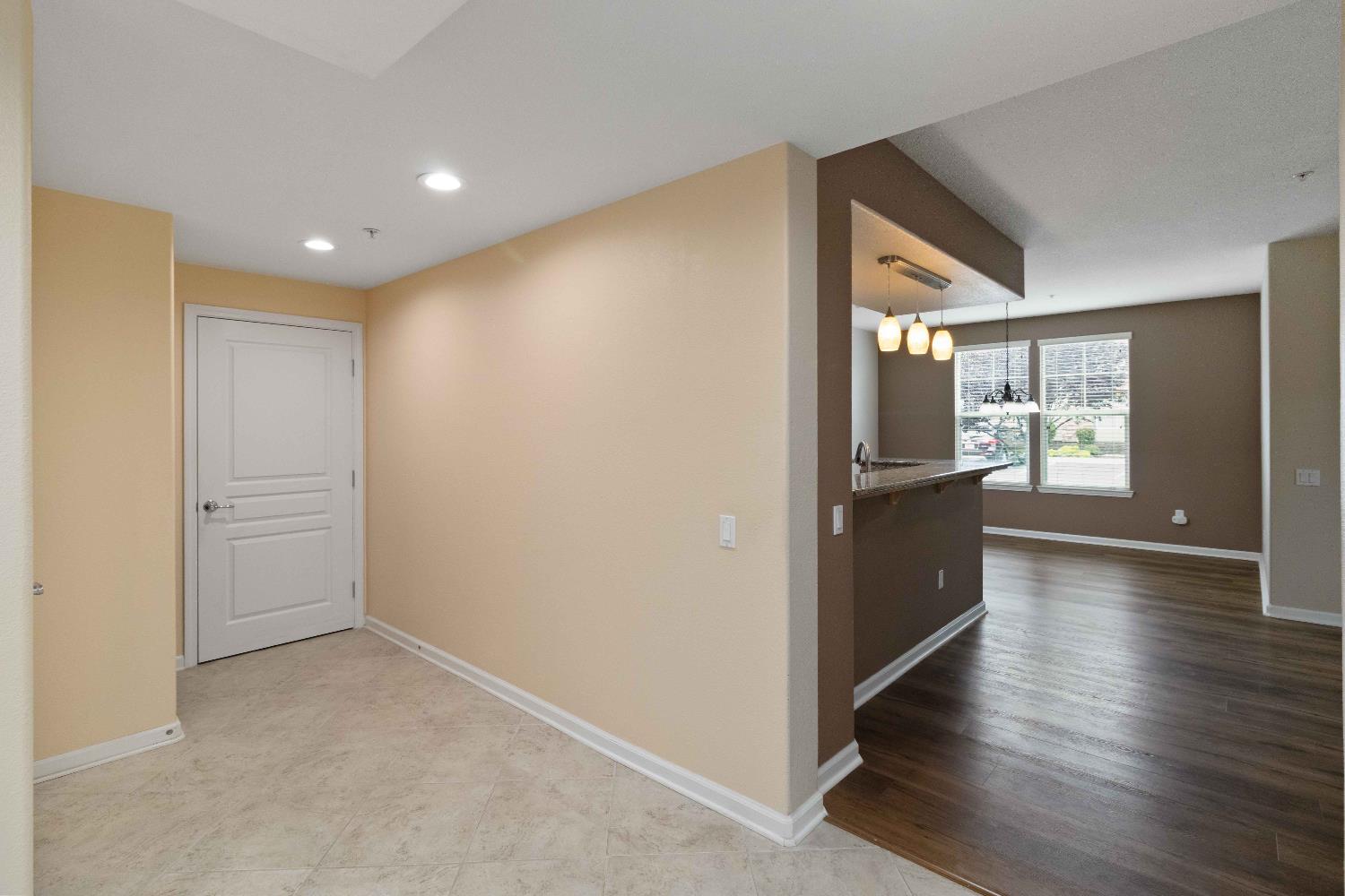 1550 Topanga Lane, Unit 101 Lincoln, CA 95648 - Photo 6 of 27 a view of a kitchen cabinets and wooden floor
