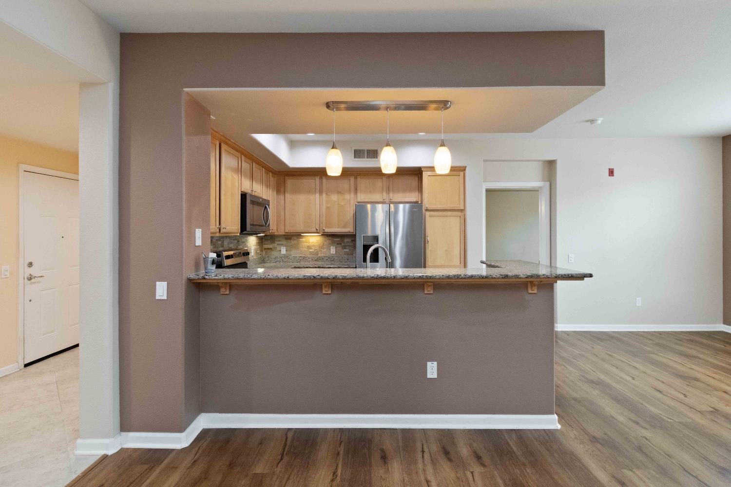 1550 Topanga Lane, Unit 101 Lincoln, CA 95648 - Photo 7 of 27 a view of kitchen with wooden floor