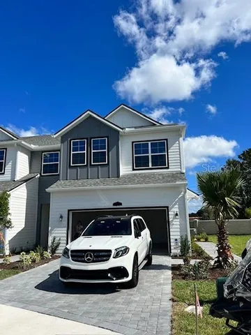 a car parked in front of a house