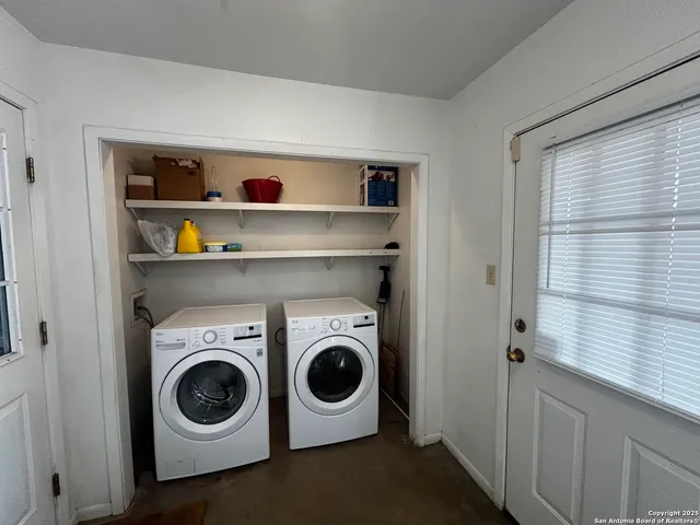 a utility room with dryer and washer