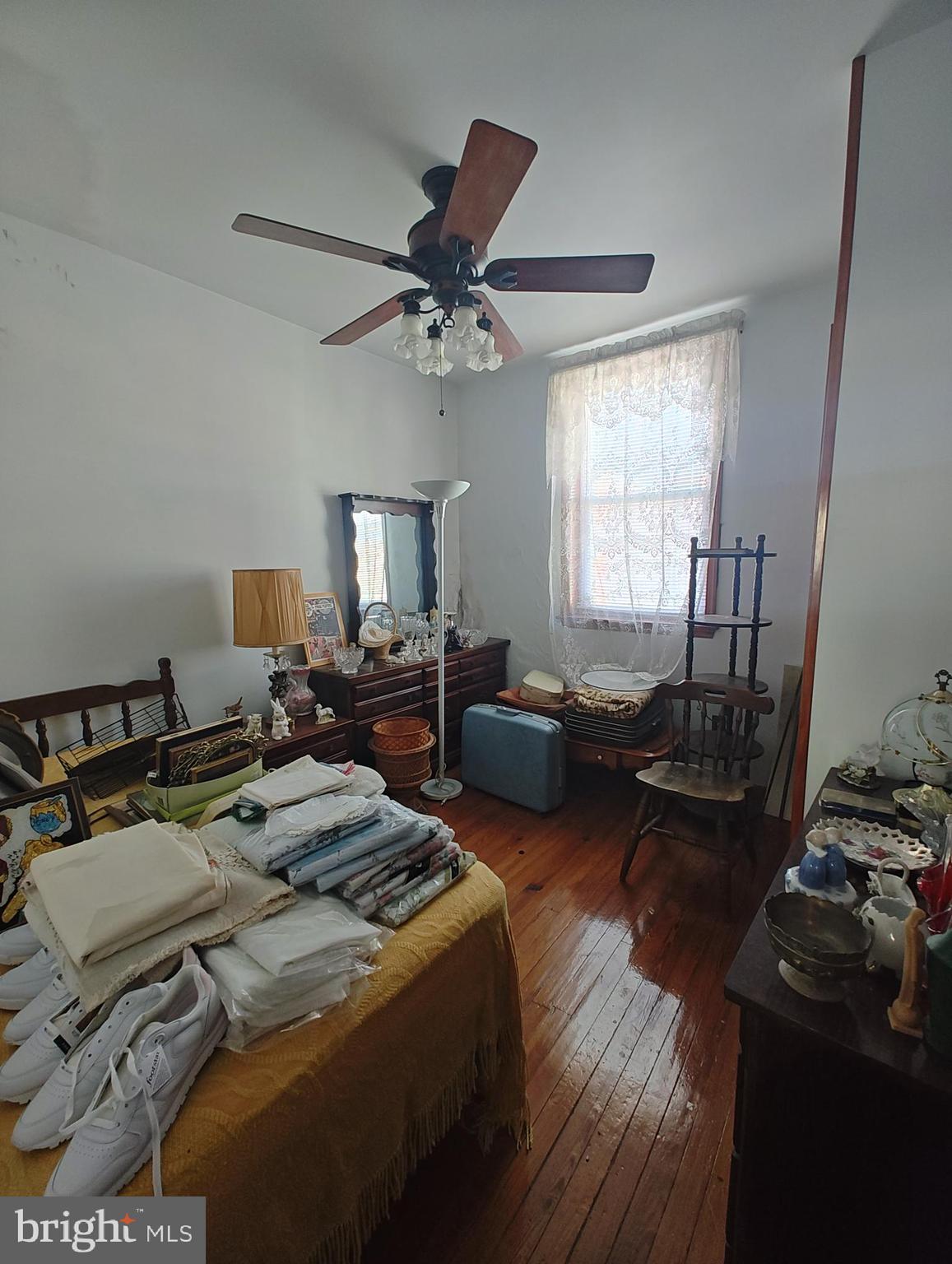 3274 Cedar Street Philadelphia, PA 19134 - Photo 12 of 18 a bed room with furniture and a window