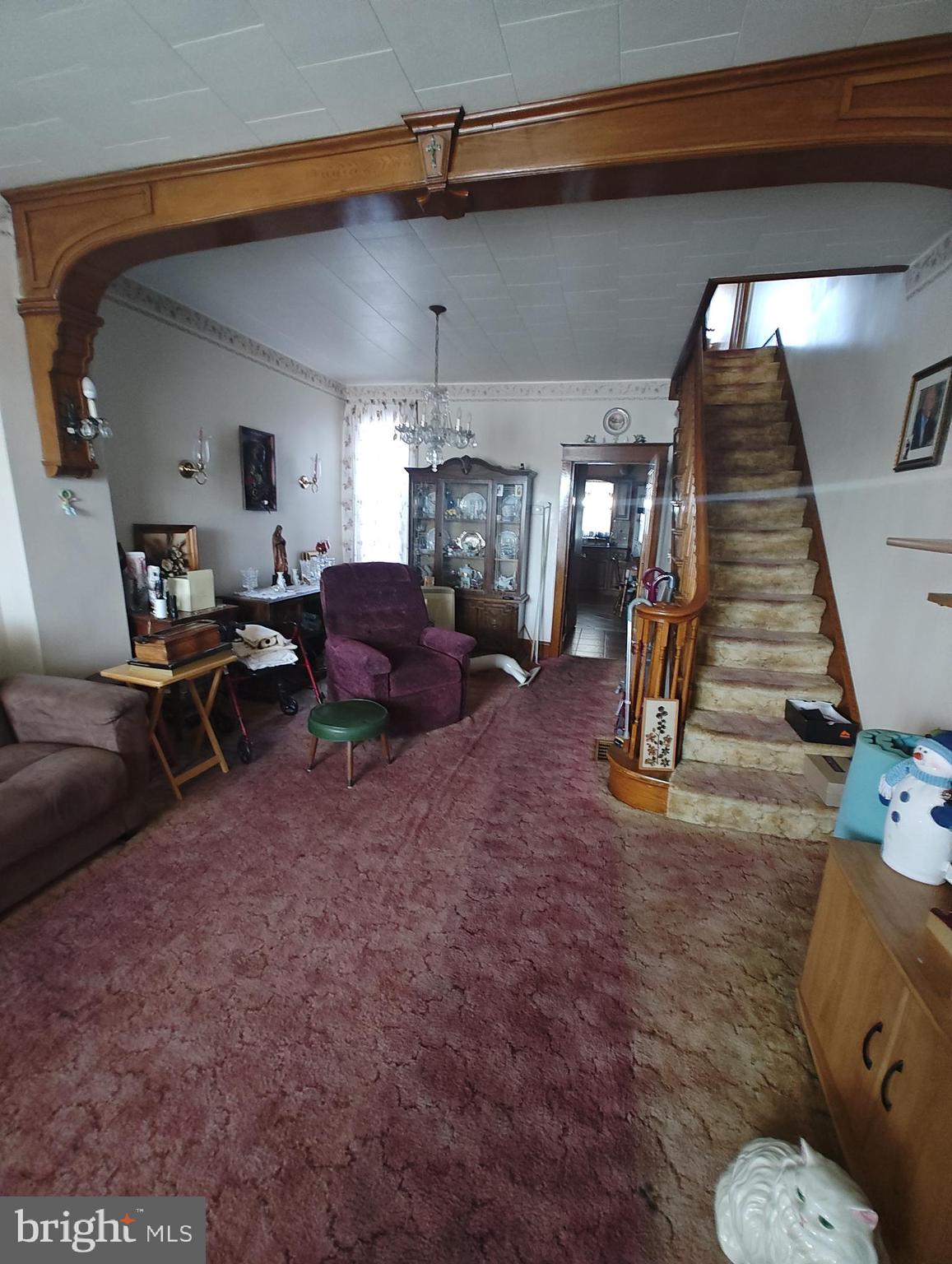 3274 Cedar Street Philadelphia, PA 19134 - Photo 4 of 18 a living room with furniture and a fireplace