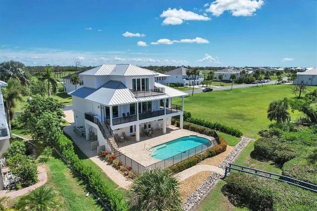 an aerial view of a house with a garden