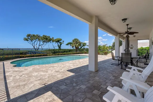 a view of a house with a swimming pool
